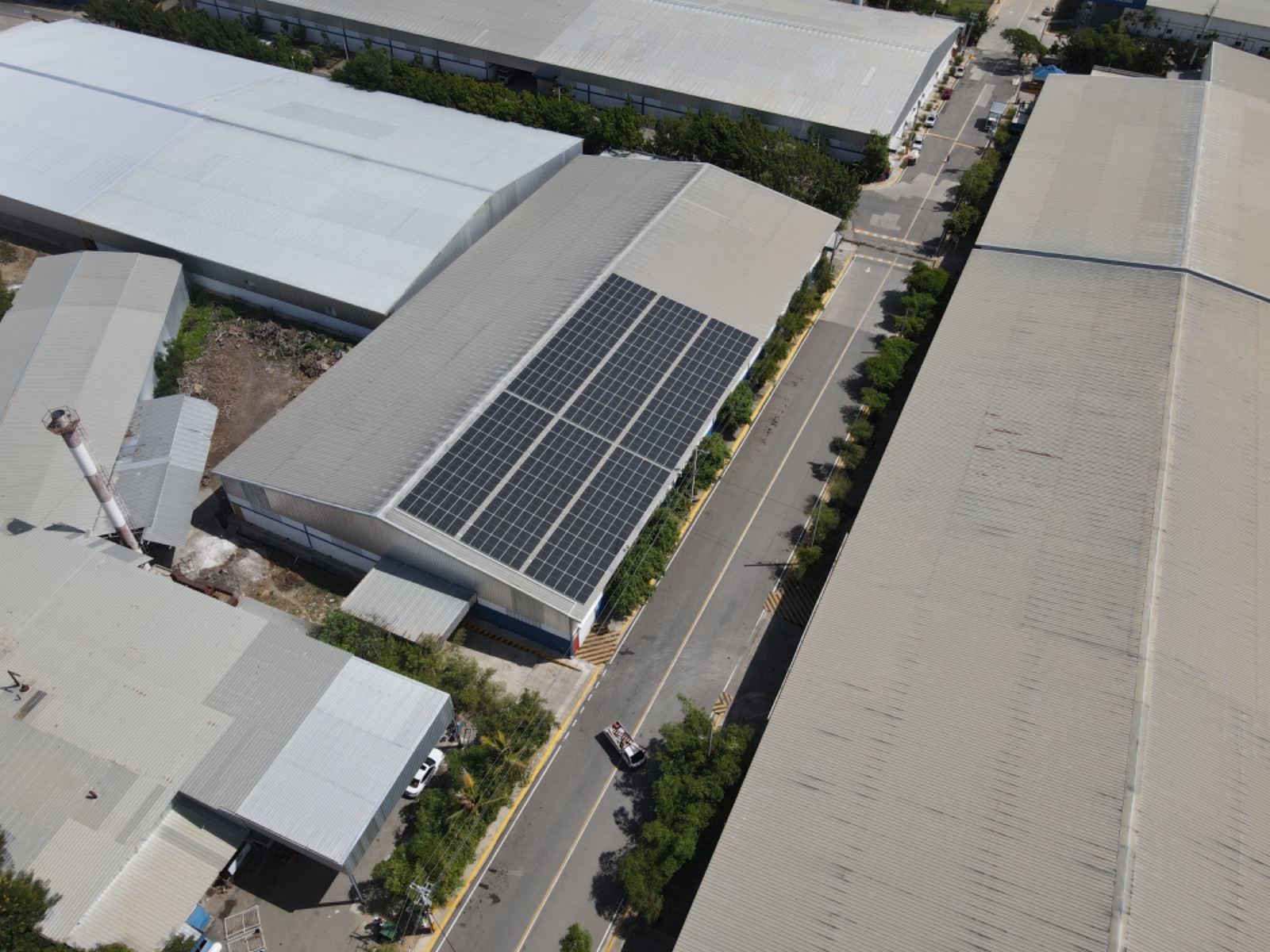 Rooftop solar panels on an industrial building at PIZFN